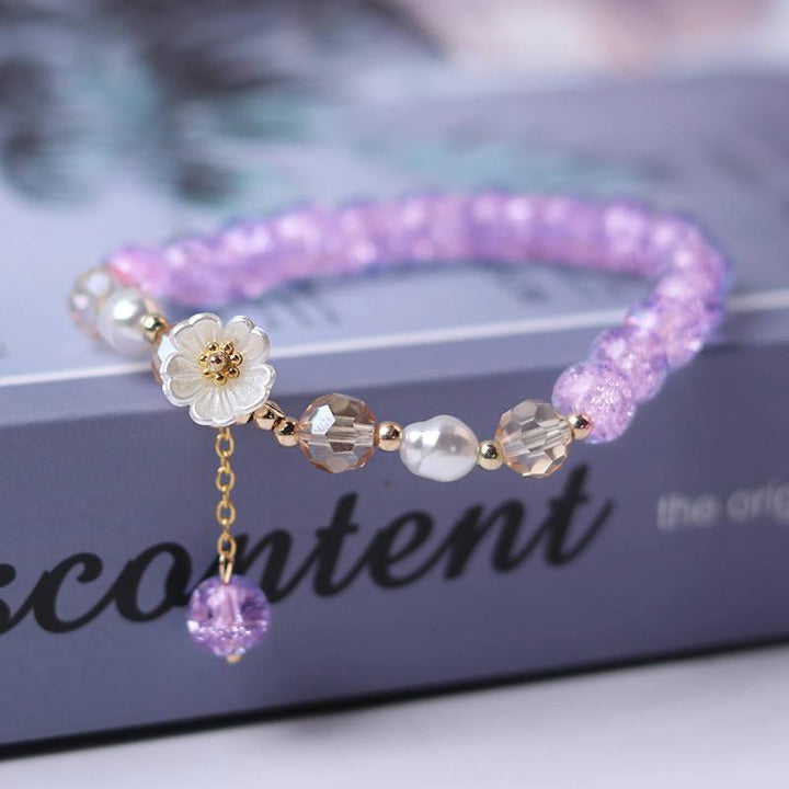 Elegant Purple Beaded White Flower Bracelet